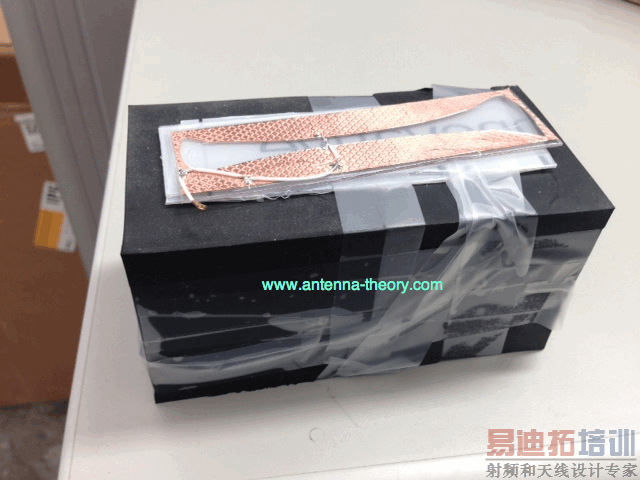 wearable antenna above a lossy material